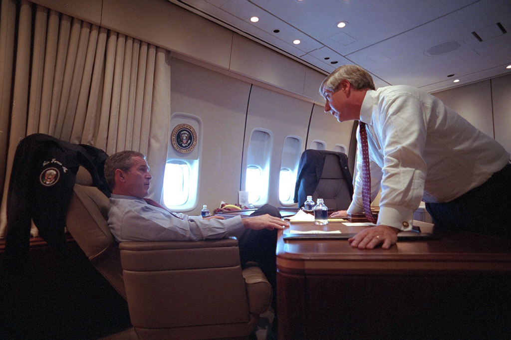 President George W. Bush speaks with White House Chief of Staff Andy Card Tuesday, Sept. 11, 2001, aboard Air Force One.